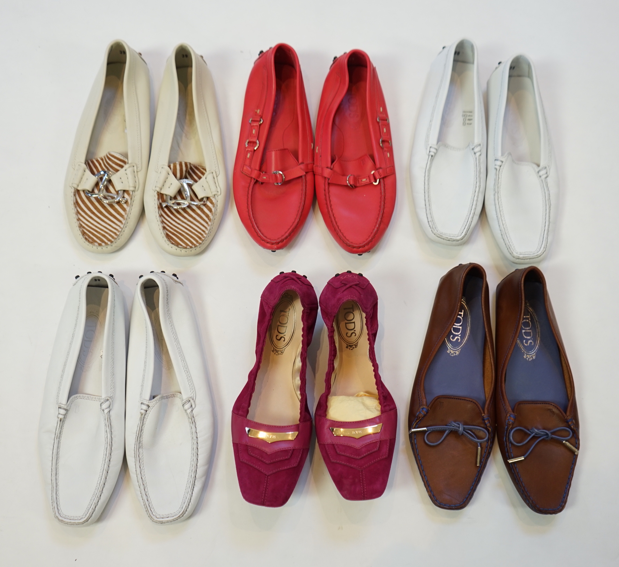 Six pairs of lady's Tod's loafers in a variety of styles and colours, size EU 39